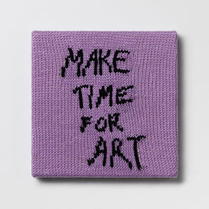 Kate Just, Rule #1: Make Time for Art, 2024, hand knitted acrylic yarn, canvas, and timber, 26 x 26 cm