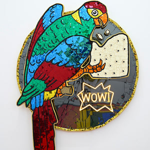 Paul Yore, Parrot (Wow), 2025, mixed media assemblage on board comprising plastic, fabric, trim, cotton thread, LED light, wood, synthetic polymer, adhesive, and fixtures, 184 x 134 x 15.5 cm irreg.