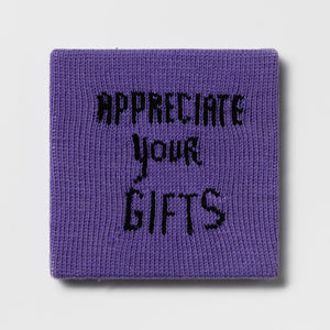 Kate Just, Rule #16: Appreciate Your Gifts, 2024, hand knitted acrylic yarn, canvas, and timber, 26 x 26 cm