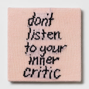 Kate Just, Rule #2: Don't Listen to Your Inner Critic, 2024, hand knitted acrylic yarn, canvas, and timber, 31 x 31 cm