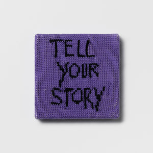 Kate Just, Rule #29: Tell Your Story, 2024, hand knitted acrylic yarn, canvas, and timber, 21 x 21 cm