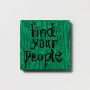 Kate Just, Rule #38: Find Your People, 2024, hand knitted acrylic yarn, canvas, and timber, 21 x 21 cm