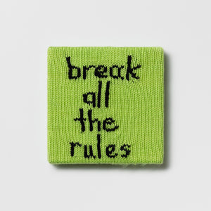 Kate Just, Rule #4: Break All The Rules, 2024, hand knitted acrylic yarn, canvas, and timber, 21 x 21 cm