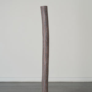 Manini Gumana, Garrapara (1289-24), 2024, Earth pigments on Stringybark hollow pole, 195 x 15.5 x 15.5 cm