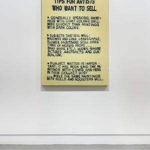 Kate Just, Tips for Artists Who Want to See reprise (a knitted homage to Tips for Artists Who Want to Sell, by John Baldessari (1966-68), acrylic on canvas, 173.36 x 143.51 x 3.81 cm) (installation view), 2024, hand knitted wool and acrylic yarn, timber, canvas, 128 x 92 cm