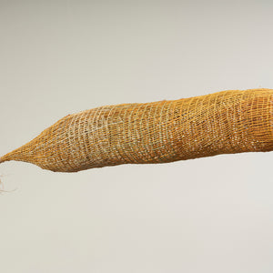 Maureen Ali, An-gujechiya (1317-24), 2024, Pandanus and Bush Cane with natural dyes, 149 x 25 x 25 cm