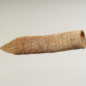 Maureen Ali,  An-gujechiya (1697-24), 2024, Pandanus and Bush Cane with natural dyes, 146 x 26 x 26 cm