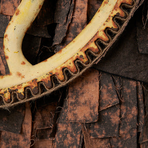 Julia Robinson, Turning over weeds and worms (detail), 2024, linen, thread, bleach, jute webbing, wheel, steel, fixings, 85 x 60 x 20 cm