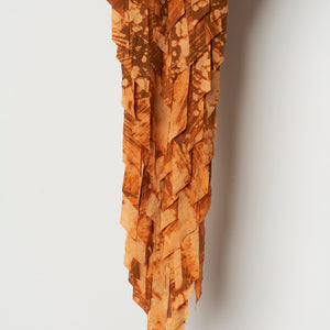 Julia Robinson, It watches with a yellow eye (detail), 2024, linen, thread, bleach, foam, wheel, steel, fixings, 120 x 40 x 25 cm