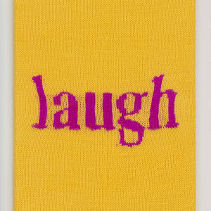 Kate Just, Laugh, 2023, from Self Care Action Series, hand knitted acrylic yarn, canvas, and timber, 55 x 40 cm