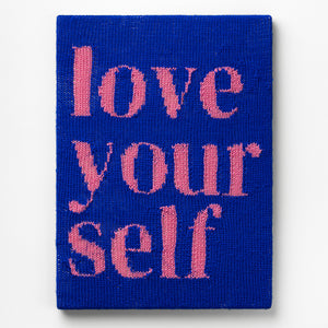 Kate Just, Love Yourself, 2023, from Self Care Action Series, hand knitted acrylic yarn, canvas, and timber, 55 x 40 cm