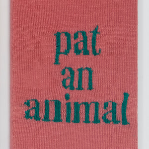 Kate Just, Pat an Animal, 2023, from Self Care Action Series, hand knitted acrylic yarn, canvas, and timber, 55 x 40 cm