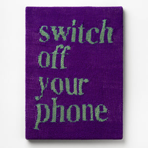 Kate Just, Switch off your Phone, 2023, from Self Care Action Series, hand knitted acrylic yarn, canvas, and timber, 55 x 40 cm
