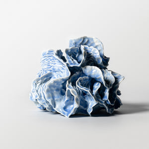 Sam Gold, From the depths, radiant and unyielding, 2024, porcelain and glaze, 17 x 24 x 27 cm irregular