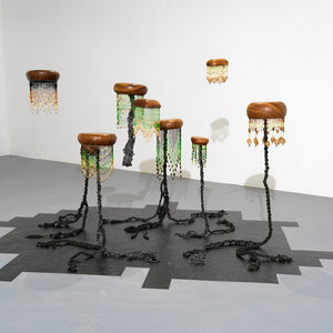 Sera Waters, 9 Son Pining (toxic needles), 2017 found wooden bowls, rope, handmade beads, beads and herringbone vinyl floor tiles, dimensions variable