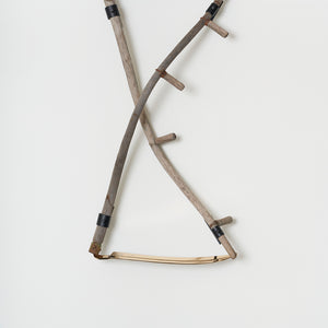 Julia Robinson, An Old Dance of Blood and Death, 2022, scythes, gold plated blade, steel, fixings, 110 x 80 x 25 cm irreg