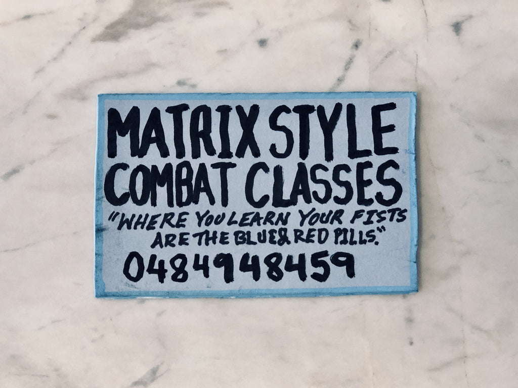 Lucas Grogan 'Matrix-Style Combat Classes' business card