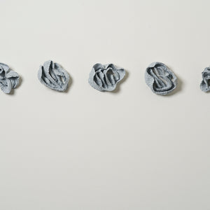 Sam Gold, A Thirst, 2023, porcelain and blue oxide 115 x 33 x 10 cm. Photography by Connor Patterson