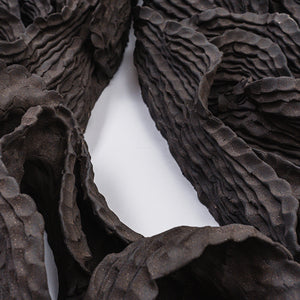 Sam Gold, All These Words Are Falling Off Of My Tongue And Into My Hands (detail), 2023, black stoneware, 94 x 43 x 12 cm. Photography by Connor Patterson
