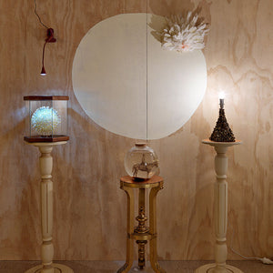 Sera Waters, The Elements: Dustbowl, thirsty work + white hot sun, 2014, From left: white hot sun: terrarium, foam ball, sequins, beads, pins. Dustbowl: glass bowl, photograph, cork, rocks and soil, water; Thirsty work: light and rocks +paint, assorted pedestals, contact, cockatoo feathers, foam ball and light, variable dimensions