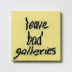Kate Just, Rule #10: Leave Bad Galleries, 2024, hand knitted acrylic yarn, canvas, and timber, 26 x 26 cm