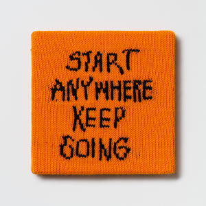 Kate Just, Rule #13: Start Anywhere, Keep Going, 2024, hand knitted acrylic yarn, canvas, and timber, 26 x 26 cm
