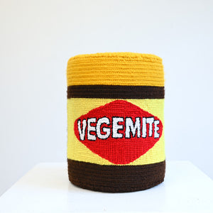 Paul Yore, Vegemite Jar, 2025, acrylic yarn needlepoint, cotton thread, and board (ongoing open edition), 18.5 x 15 x 15 cm
