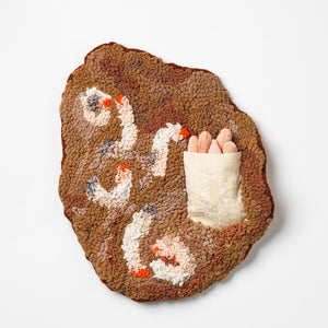 Sera Waters, Grubby Tidings; Dug up morsels of love, 2024, hessian, wool, with repurposed negligees, stockings, nylon tape, pocket, cushion, glove, 42 x 35 cm
