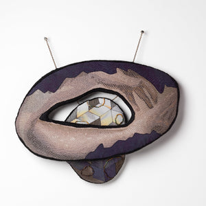 Sera Waters, Patterns of Min(e)ing: Embrace of Stone, 2025, cotton, linen, hand-dyed calico, beads, glow-in-the-dark thread, repurposed chain, stuffing, felt, approximately 32 x 34 cm (installed). Photo by Grant Hancock
