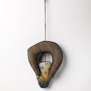 Sera Waters, Patterns of Min(e)ing: Grab, 2025, cotton, linen, hand-dyed calico, beads, repurposed chain, stuffing, felt, approximately 35 x 13 cm (installed). Photo by Grant Hancock
