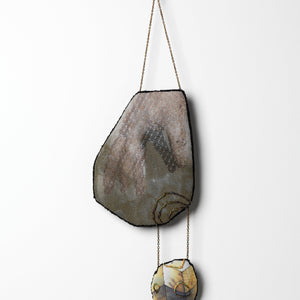 Sera Waters, Patterns of Min(e)ing: Inhumed Riches, 2025, cotton, linen, hand-dyed calico, beads, repurposed chain, stuffing, felt, approximately 42 x 13 cm (installed). Photo by Grant Hancock