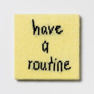 Kate Just, Rule #33: Have a Routine, 2024, hand knitted acrylic yarn, canvas, and timber, 26 x 26 cm
