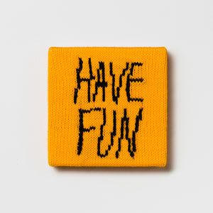 Kate Just, Rule #50: Have Fun, 2024, hand knitted acrylic yarn, canvas, and timber, 21 x 21 cm