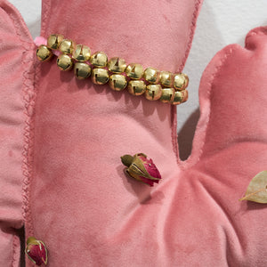 Kate Mitchell, Keeping Soft Power At The Forefront (detail), 2025, velvet, silk, stuffing, thread, pins, dried rose buds, bay leaves, LED lights and spell-water, 60 x 120 x 5 cm (text) (lights variable)
