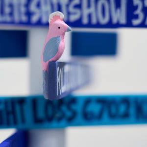 Lucas Grogan, A Guide (with galahs) (detail image), 2025, wood, polymer, acrylic, and motor, 110 x 25 x 25 cm