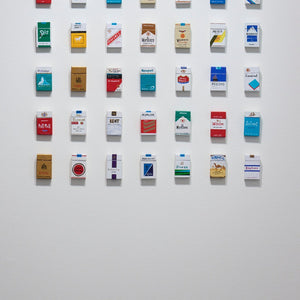 Marc Etherington's cigarette packs at Hugo Michell Gallery, 2024.