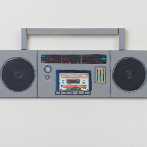Marc Etherington, Ulcerative Colitis Theme Music (boombox), 2024, acrylic on hand cut board, 23.5 x 51.5 cm irregular