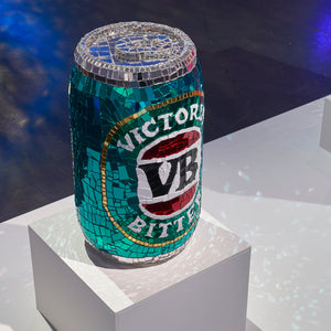 Paul Yore, Victoria Bitter Can (installation view), 2025, mixed media sculptural assemblage on plastic comprising plastic, glass, crockery, found objects, wood, adhesive, synthetic polymer, and fixtures, 53 x 32 x 32 cm