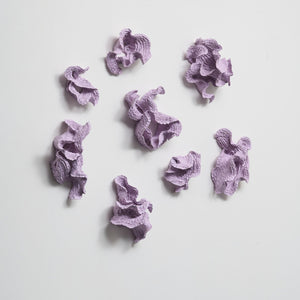 Sam Gold, Before you bite, wipe the milk (installation view), 2026, dirty porcelain & heat cured enamel, 93 × 115 × 15 cm