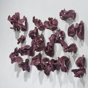 Sam Gold, Devotion left its stain (installation view), 2026, dirty porcelain & heat cured enamel, 96 × 210 × 24 cm