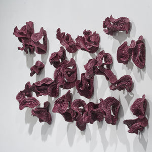 Sam Gold, Devotion left its stain (installation view), 2026, dirty porcelain & heat cured enamel, 96 × 210 × 24 cm