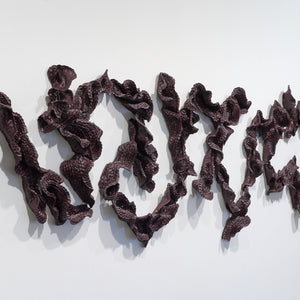 Sam Gold, Give everything to the sea (installation view), 2026, dirty porcelain & heat cured enamel, 91 × 330 × 13 cm