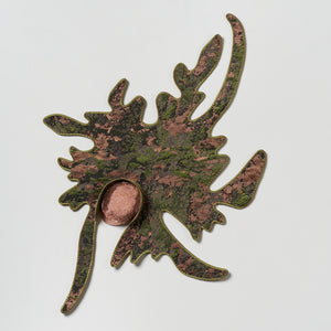 Julia Robinson, Flush-cut, 2025, copper-plated log, jacquard, silk, thread, felt, interfacing, steel, magnets, 85 x 65 x 5 cm irreg.