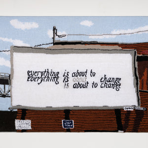 Kate Just, A Sign of the Times: A knitted translation of Alyson Provax, Untitled everything, 2018, a billboard, letterpress installed at Nickerson St and Florentia St in Seattle, USA as part of a-lone with Vignettes + Gramma Press), 2026, hand knitted acrylic yarn, timber, canvas, 66 x 91 cm