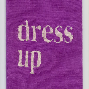 Kate Just, Dress Up, 2023, from Self Care Action Series, hand knitted acrylic yarn, canvas, and timber, 55 x 40 cm 