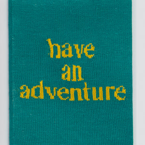 Kate Just, Have an Adventure, 2023, from Self Care Action Series, hand knitted acrylic yarn, canvas, and timber, 55 x 40 cm 