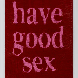 Kate Just, Have Good Sex, 2023, from Self Care Action Series, hand knitted acrylic yarn, canvas, and timber, 55 x 40 cm 