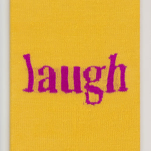 Kate Just, Laugh, 2023, from Self Care Action Series, hand knitted acrylic yarn, canvas, and timber, 55 x 40 cm 
