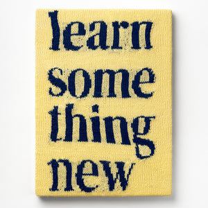 Kate Just, Learn Something New, 2023, from Self Care Action Series, hand knitted acrylic yarn, canvas, and timber, 55 x 40 cm 