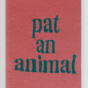 Kate Just, Pat an Animal, 2023, from Self Care Action Series, hand knitted acrylic yarn, canvas, and timber, 55 x 40 cm 